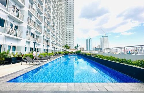 Pasay Apartment | Coast Residences - 2 Bedroom with Balcony facing Mall of Asia, Manila Bay & Pool View