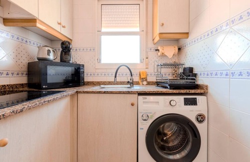 Els Arenals del Sol Apartment | Coastal Comfort with Pool & Parking