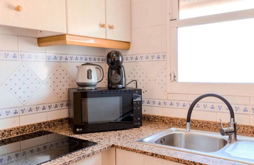 Els Arenals del Sol Apartment | Coastal Comfort with Pool & Parking