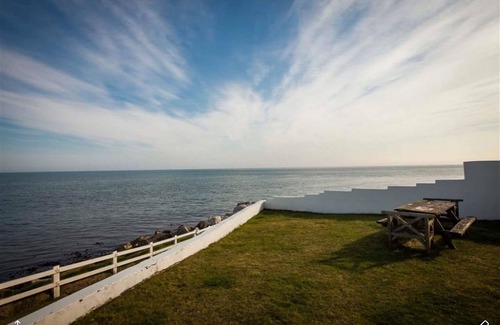 Glenariff Cottage | Coastal cottage , historic and award winning, absolute ocean front rural glens