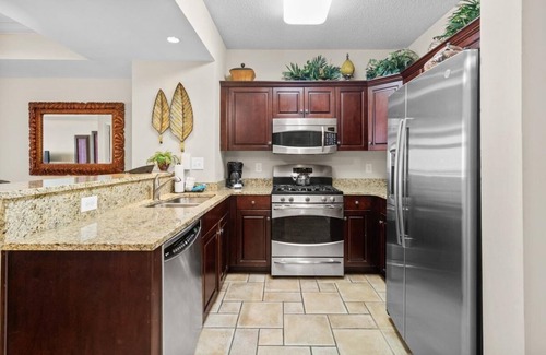 Windy Hill Condo | Coastal Elegance 2BR Condo Jetted Tub and Balcony