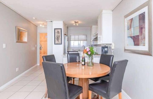 Lagoon Beach Apartment | Coastal Escape with Stunning Mountain Backdrop