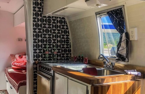 Irwin House | Coca-Cola themed 1968 Airstream. Walk to the Snake River.