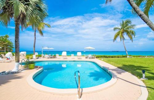 Seven Mile Beach House | Cocoplum #1 Condo