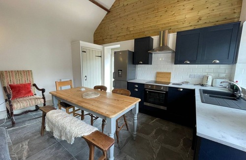 Cowbridge Apartment | Cohost Partners Cozy Farmhouse Stunning Views