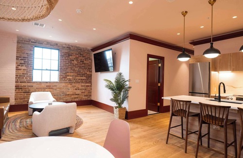 New Orleans Hotel | Colorful 4BR Suite w/Pool steps to St. Charles Ave!