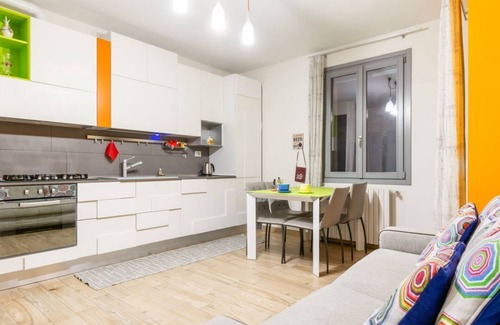 Le Cure Apartment | Colorful Boccaccio apt with Patio and Motorcycle Place