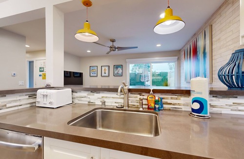 Hermosa Village Condo | Colorful & contemporary condo with patio & washer/dryer - watch the fireworks