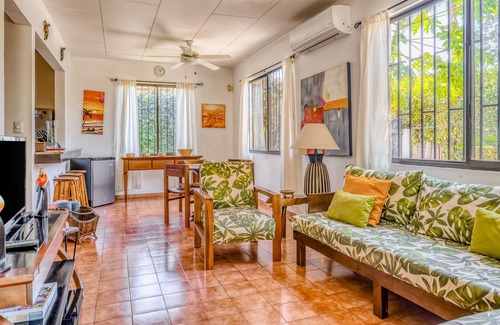 Barrio Ricos y Famosos House | Colorful, dog-friendly home with private pool, W/D, & lush setting