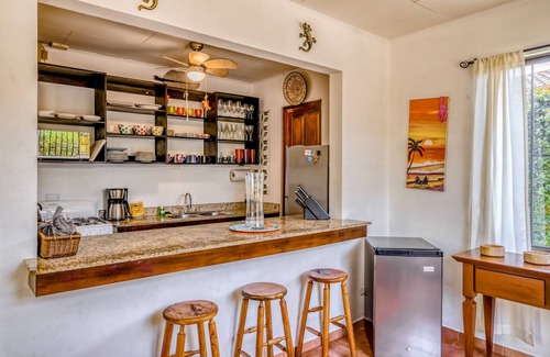 Barrio Ricos y Famosos House | Colorful, dog-friendly home with private pool, W/D, & lush setting