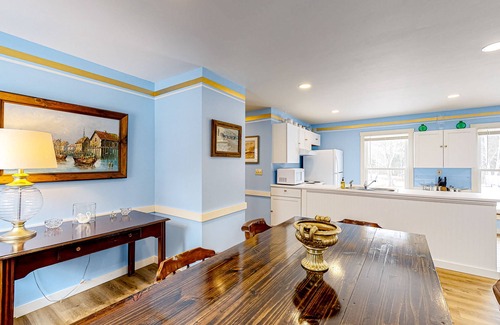Boothbay Harbor House | Colorful duplex home with a large yard, deck, WiFi, & ideal Midcoast location