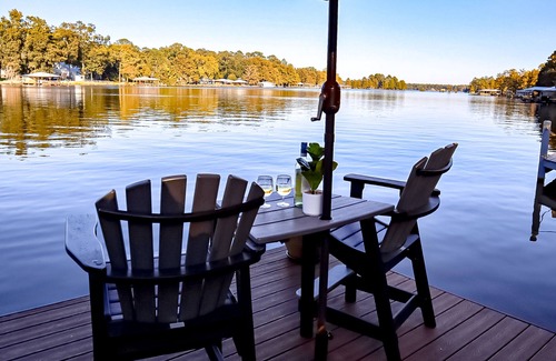 Cobb Cabin | Colorful lakefront home with private dock, scenic porch, washer/dryer, & AC
