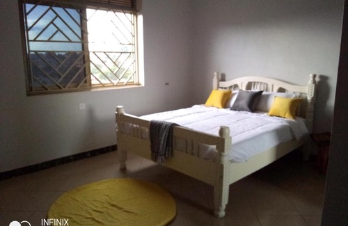 Bukoto Apartment | Colorful, spacious artistic home