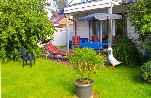 Schonberger Strand Apartment | Comfortable, ground-floor vacation apartment with terrace and garden to make you feel at home.