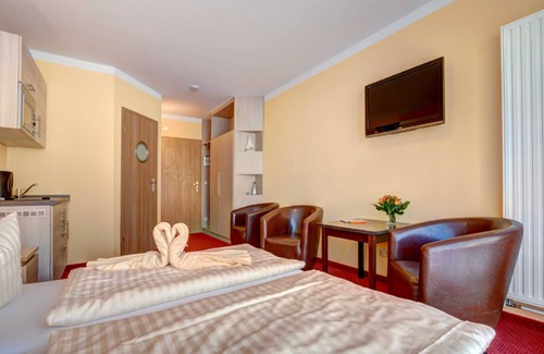 Ahlbeck House | Comfort room with pantry kitchen - Aparthotel Strandhus Trivago Award Best 3