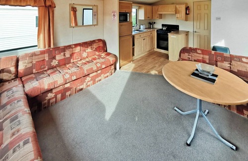 Ludchurch House | Comfortable and spacious 12ft-wide caravan with one double and one twin.