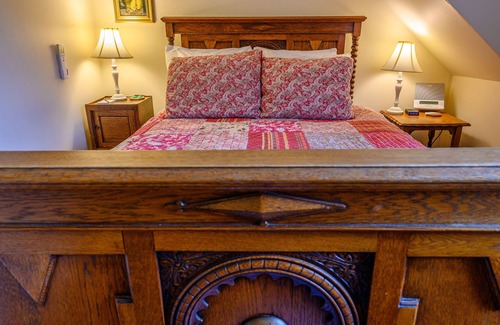 Stowe Bed & Breakfast | Comfortable budget room with queen bed, a stunning view of Mount Mansfield, and all-glass shower stall with full service breakfast included