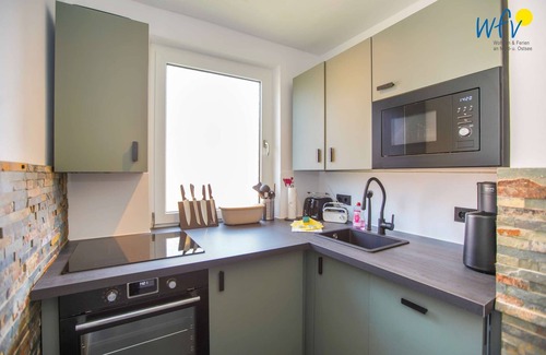 Borkum House | Comfortable bungalow with sunny terrace and garden!