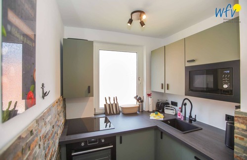 Borkum House | Comfortable bungalow with sunny terrace and garden!