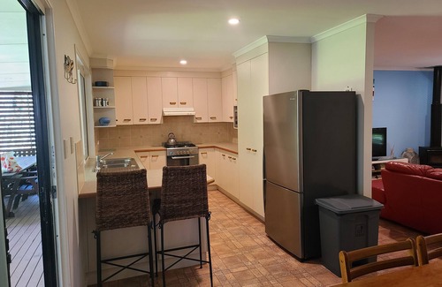 Brisbane Waterfront House | Comfortable Family Beach Side Cottage just a lazy 5min stroll to the water.