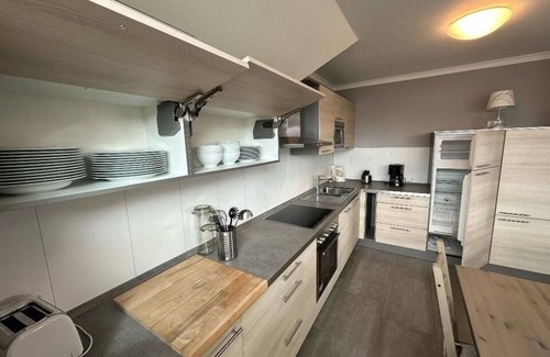Burg auf Fehmarn Apartment | Comfortable vacation home Nini with balcony, garden and modern furnishings
