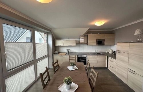 Burg auf Fehmarn Apartment | Comfortable vacation home Nini with balcony, garden and modern furnishings