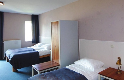 Municipality of Hellevoetsluis Apartment | Comfy family room with balcony, close to the beach