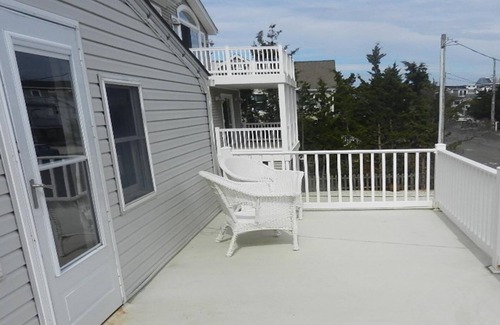 Ship Bottom House | Compact and cozy two-bedroom duplex sleeps six.