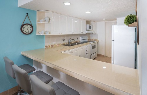 Zona Hotelera Norte Condo | Condo 101, Swimming pool level oceanfront condo, Pristine grounds and pool!