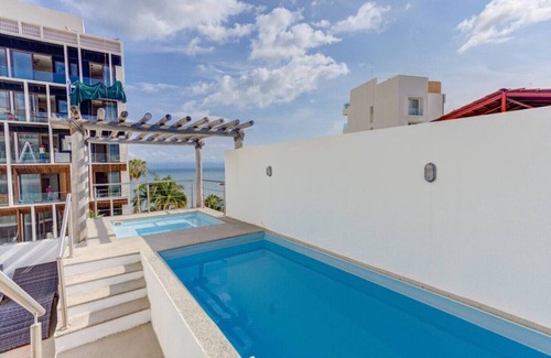 La Cruz de Huanacaxtle Condo | Condo 2BD con alberca en roof!