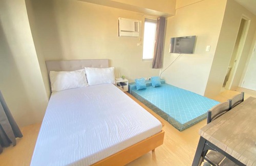 North Reclamation Area Apartment | Condo across SM City Cebu with Wifi, up to 4 person