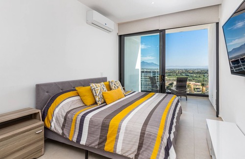 Flamingos Condo | Condo Aria Ocean 1012 by Kivoya