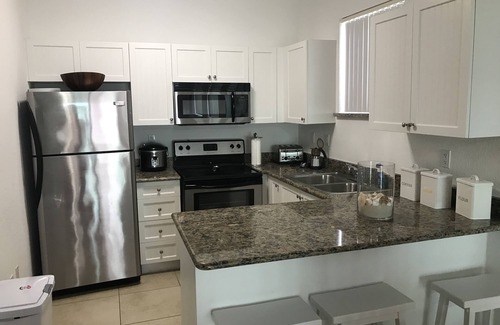 Alice Town Condo | Condo, Bimini Bay. Steps away from crystal clear turquoise waters.