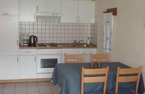 Beltheim Condo | Condo-Mobility bath-Garden view