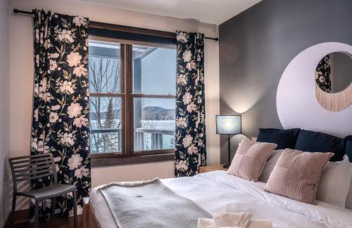 Lac Superieur Village House | Condo overlooking Lac Superieur & mountain views