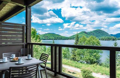 Lac Superieur Village House | Condo overlooking Lac Superieur & mountain views