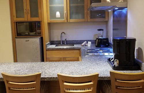Villa Juarez Resort | Condo, with Jacuzzi and mini pool at porch. A beach nearby with lot of amenities