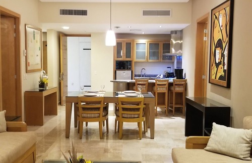 Villa Juarez Resort | Condo, with Jacuzzi and mini pool at porch. A beach nearby with lot of amenities