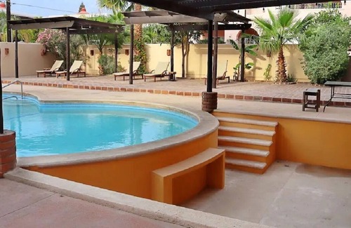 Colonia El Progreso Hotel | Condos HB