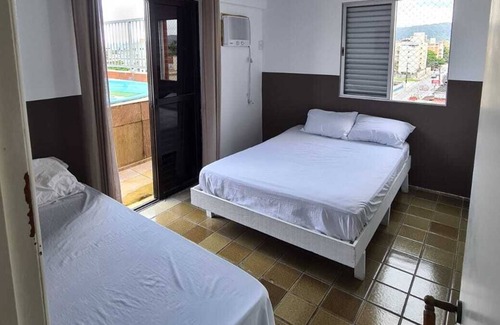 Parque Enseada Apartment | Confortável cobertura com piscina privativa