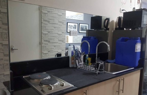 San Juan Condo | Contemporary style condo stay in the Heart of Manila with A/C+Wifi+Cable