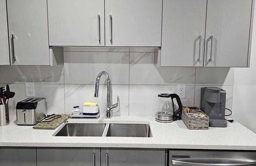 Southwest Edmonton House | Contemporary Two Bedroom Basement Suite.