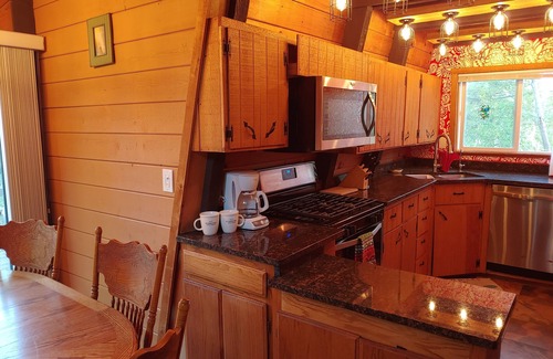Mountainaire House | Cool Down in Mountainaire Manor > Hot Tub in the Pines w/Movie Theater