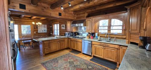 McHenry House | Coopers Run Five Bedroom Log Home with Hot Tub Pool Table and Views