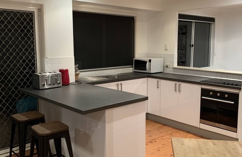 Copacabana House | Copa Beach House, family friendly, 2 min flat walk to beach, huge backyard