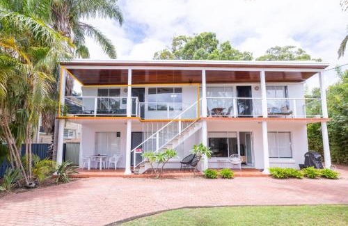 Corlette Apartment | Copacabana 4 61 Sandy Point Rd - water views, air con and WiFi
