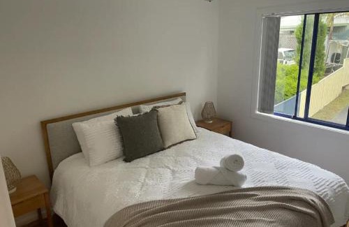 Corlette Apartment | Copacabana 4 61 Sandy Point Rd - water views, air con and WiFi
