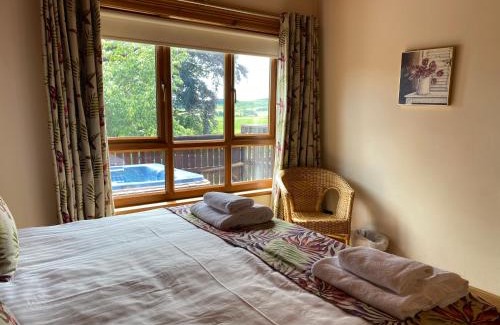 Cupar Ski Chalet | Copper Beech Lodge with Hot Tub