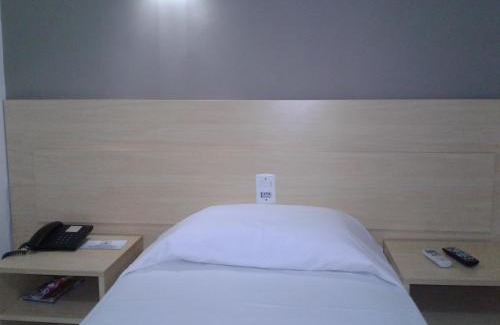Menino Deus Hotel | CORAL EXPRESS Prox á PUCRS, 5klm de distancia