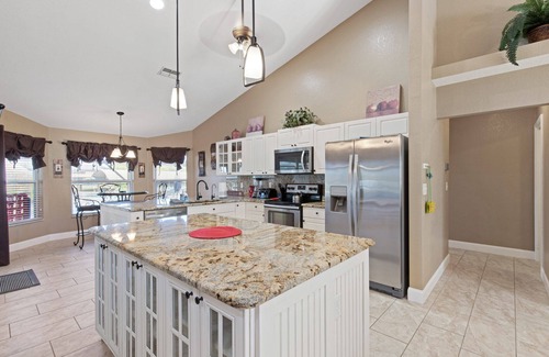 Burnt Store House | Coral Paradise - 4/2 Gulf Access Home with Electric Heated Pool, Game Room, Kayaks, Tiki Hut